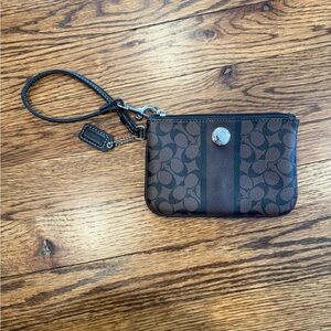 Elegant Brown Wristlet with Logo Design